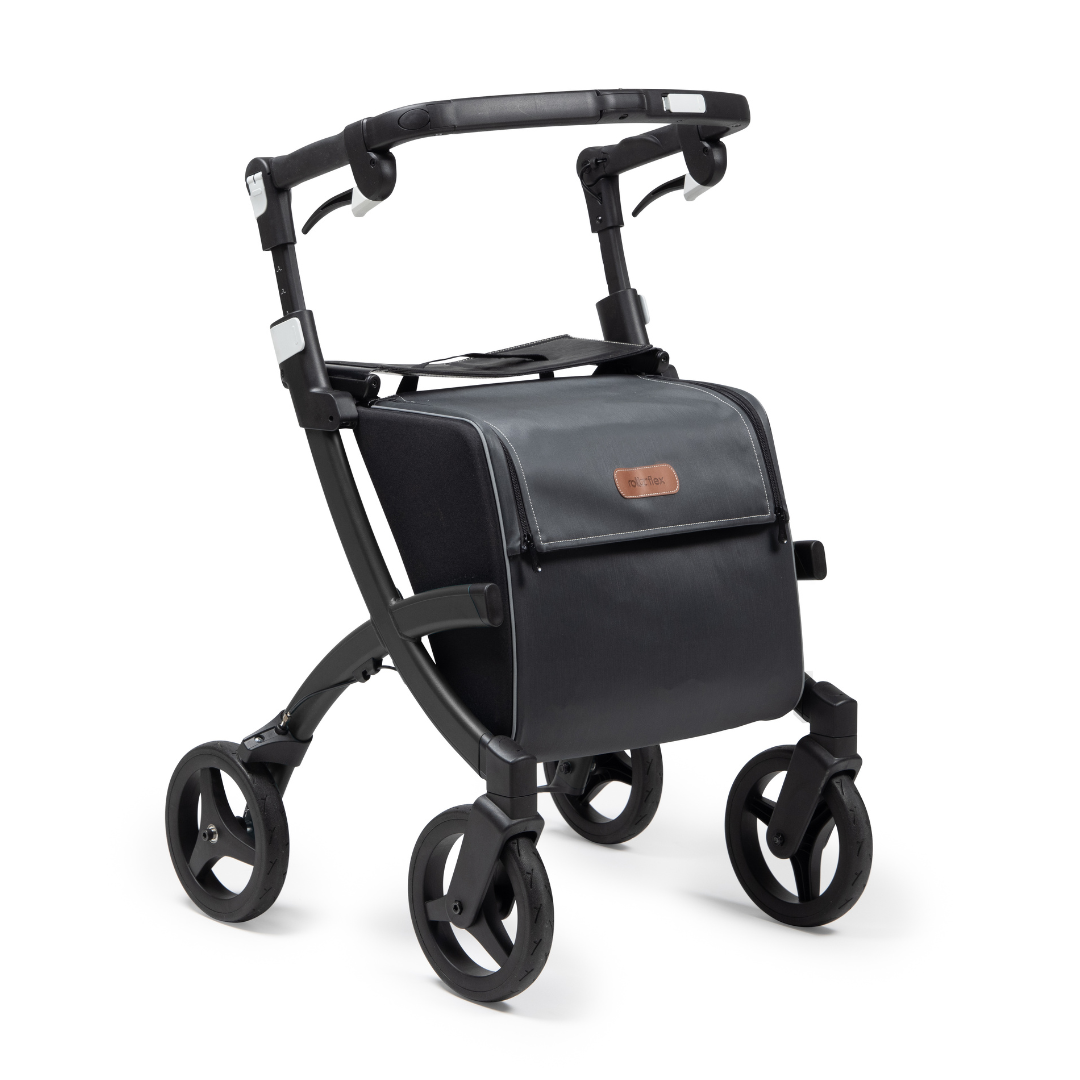 The Rollz FLEX 2 Lightweight Rollator Walker, featuring a modern black design with four wheels and a sturdy frame, offers an adjustable handlebar and a compact layout. It includes a large XL storage bag beneath the seat, making it practical for busy parents on the go.